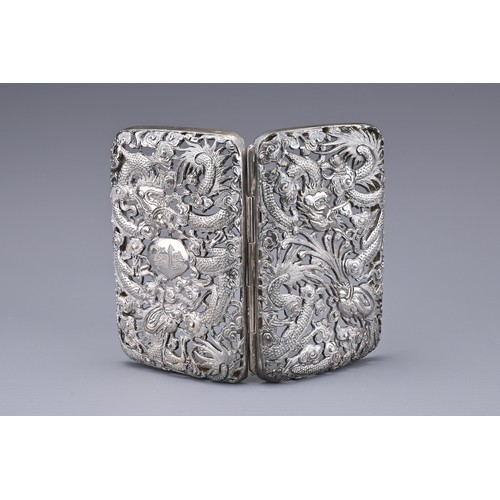 53 - A CHINESE SILVER CIGARETTE CASE, 19/20TH CENTURY. Both covers with pierced and embossed decoration o... 