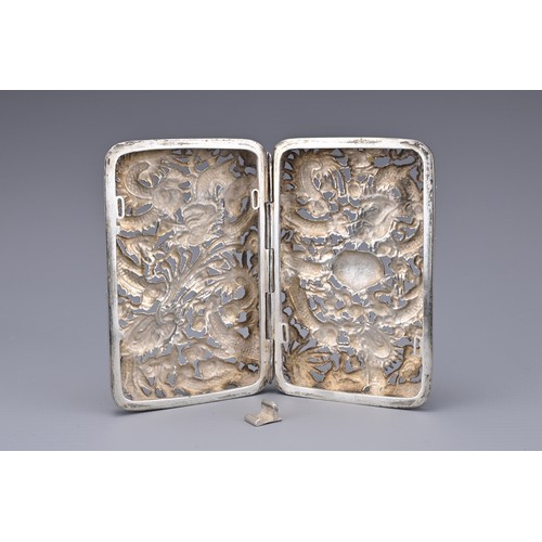 53 - A CHINESE SILVER CIGARETTE CASE, 19/20TH CENTURY. Both covers with pierced and embossed decoration o... 