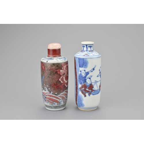 45 - TWO CHINESE UNDERGLAZE BLUE AND COPPER RED PORCELAIN SNUFF BOTTLES, QING DYNASTY. Both of cylindrica... 