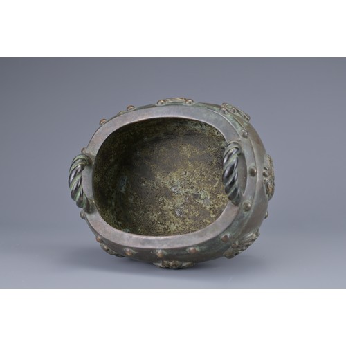 59 - A CHINESE BRONZE BAJIXIANG CENSER AND COVER. Of drum shape with raised rope twist handles on four le... 