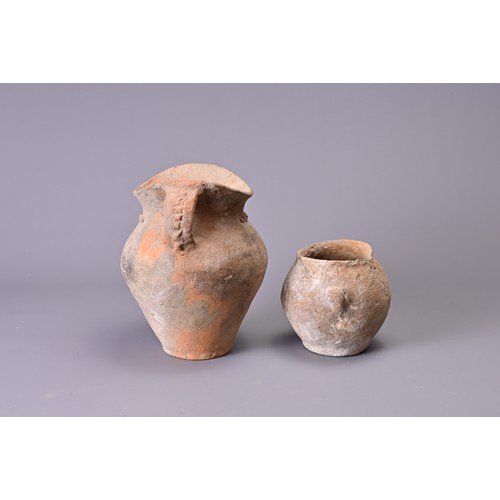 191 - TWO CHINESE NEOLITHIC POTTERY JARS. To include a Siwa pottery jar with saddle like rim and two stap ... 