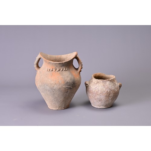 191 - TWO CHINESE NEOLITHIC POTTERY JARS. To include a Siwa pottery jar with saddle like rim and two stap ... 