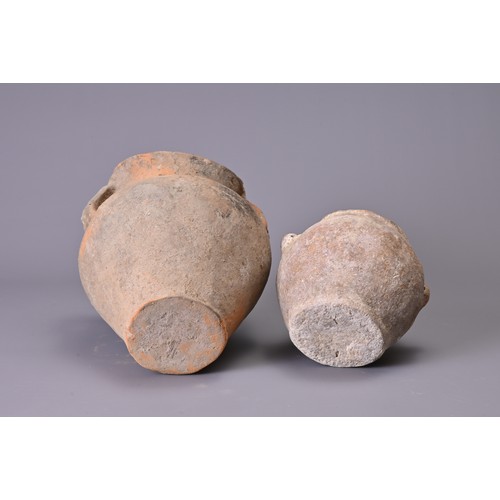 191 - TWO CHINESE NEOLITHIC POTTERY JARS. To include a Siwa pottery jar with saddle like rim and two stap ... 