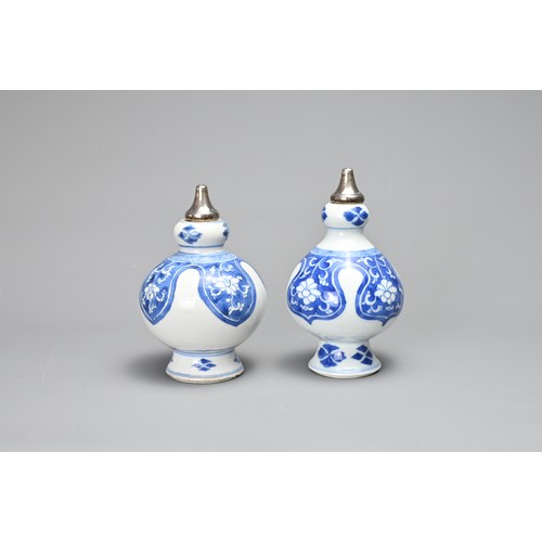 3 - FOUR CHINESE PORCELAIN ITEMS, 18TH CENTURY. To include two sections of blue and white porcelain bott... 