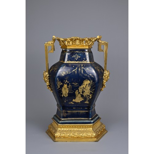 52 - A CHINESE POWDER BLUE AND GILT DECORATED VASE WITH ORMOLU MOUNT, 18/19TH CENTURY. The hexagonal vase... 