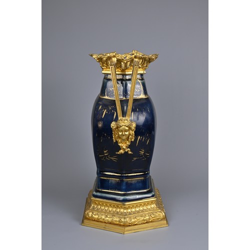 52 - A CHINESE POWDER BLUE AND GILT DECORATED VASE WITH ORMOLU MOUNT, 18/19TH CENTURY. The hexagonal vase... 