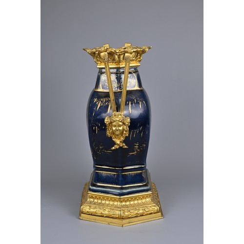 52 - A CHINESE POWDER BLUE AND GILT DECORATED VASE WITH ORMOLU MOUNT, 18/19TH CENTURY. The hexagonal vase... 