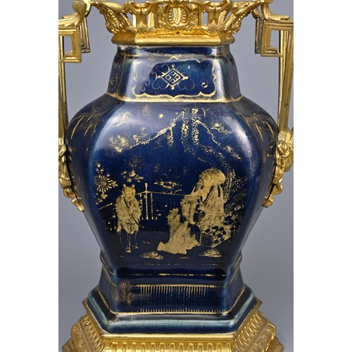 52 - A CHINESE POWDER BLUE AND GILT DECORATED VASE WITH ORMOLU MOUNT, 18/19TH CENTURY. The hexagonal vase... 