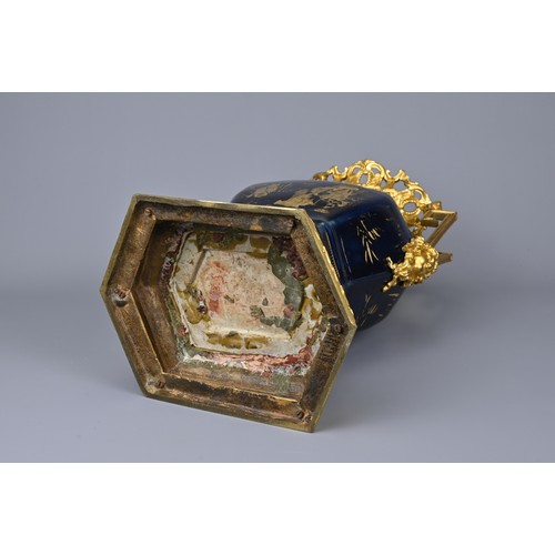 52 - A CHINESE POWDER BLUE AND GILT DECORATED VASE WITH ORMOLU MOUNT, 18/19TH CENTURY. The hexagonal vase... 