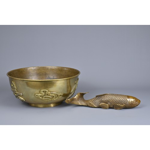 10 - TWO CHINESE / JAPANESE BRONZE ITEMS, EARLY 20TH CENTURY. To include a large rounded bowl with raised... 