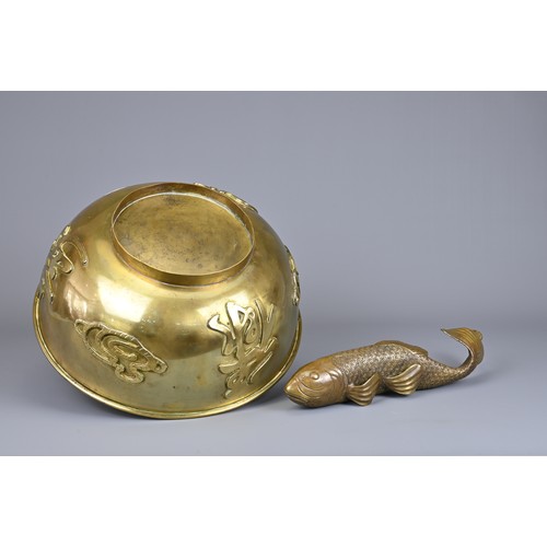 10 - TWO CHINESE / JAPANESE BRONZE ITEMS, EARLY 20TH CENTURY. To include a large rounded bowl with raised... 