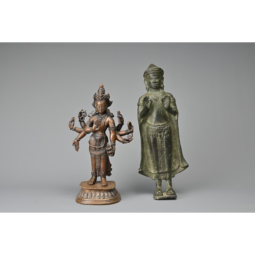 31 - TWO CAMBODIAN AND INDIAN BRONZE FIGURES OF DEITIES, 19/20TH CENTURY. A Cambodian Khmer style standin... 