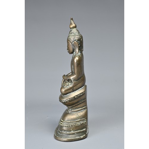 33 - A SOUTH EAST ASIAN BRONZE FIGURE OF DEITY, 19/20TH CENTURY. Seated on pedestal base. 17.5cm tall