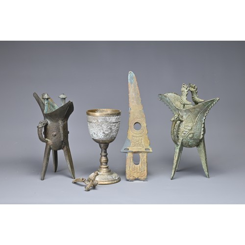 37 - A GROUP OF BRONZE ITEMS. To include two Chinese archaic stye bronze ritual tripod vessels, Jue; A Ch... 