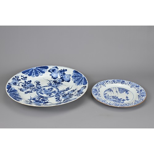 53 - TWO CHINESE BLUE AND WHITE DISHES, 18TH CENTURY. To include a large Kangxi (1662-1722) deep dish wit... 