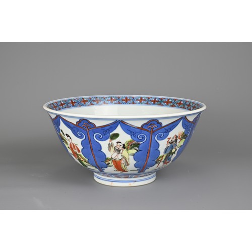 69 - A CHINESE WUCAI PORCELAIN IMMORTALS BOWL, WANLI MARK. Decorated with floral medallion to the interio... 