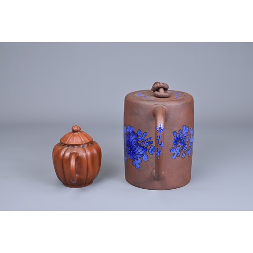 79 - TWO CHINESE TAIWAN YIXING POTTERY TEA POTS, 20TH CENTURY. A cylindrical form teapot with blue enamel... 