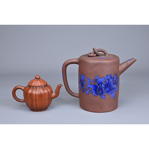 79 - TWO CHINESE TAIWAN YIXING POTTERY TEA POTS, 20TH CENTURY. A cylindrical form teapot with blue enamel... 