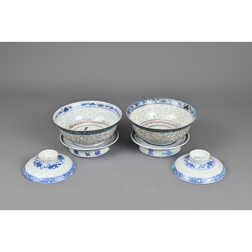 98 - A PAIR OF CHINESE PORCELAIN RICE GRAIN BOWLS, KANGXI MARK, LATE QING DYNASTY. Each bowl decorated in... 