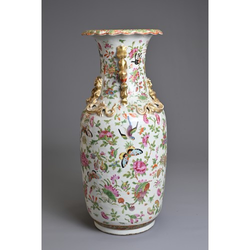 2 - A CHINESE CANTON FAMILLE ROSE PORCELAIN VASE, 19TH CENTURY. Of baluster form decorated with birds, b... 