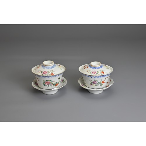 12 - A PAIR OF CHINESE FAMILLE ROSE CUPS AND STANDS, EARLY 20TH CENTURY. Finley potted cups with enamel d... 