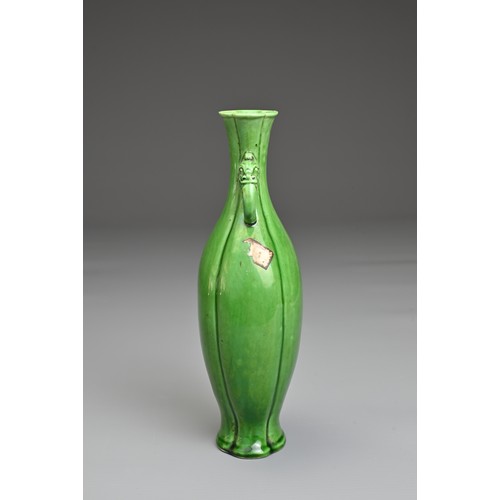 14 - A CHINESE GREEN GLAZED PORCELAIN VASE. Flattened baluster form with lobed body and rim in four secti... 