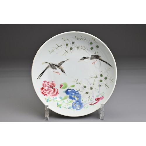 27 - A CHINESE FAMILLE ROSE PORCELAIN DISH, YONGZHENG MARK 18TH CENTURY. Decorated with two magpies with ... 