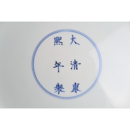 30 - A CHINESE BISCUIT ENAMELLED SANCAI PORCELAIN DISH, KANGXI MARK. Creamy white glazed porcelain body i... 