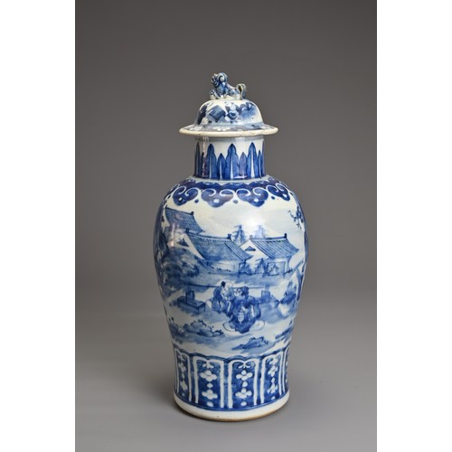 51 - A CHINESE BLUE AND WHITE PORCELAIN VASE AND COVER, 19TH CENTURY. Decorated with figures and hawkers ... 