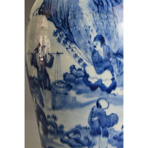 51 - A CHINESE BLUE AND WHITE PORCELAIN VASE AND COVER, 19TH CENTURY. Decorated with figures and hawkers ... 