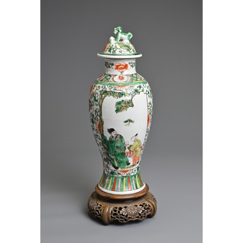 53 - TWO CHINESE FAMILLE VERTE PORCELAIN ITEMS, 19TH CENTURY. To include a vase and cover decorated with ... 