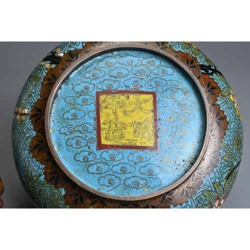 54 - A CHINESE CLOISONNE ENAMEL BOWL WITH WOODEN STAND, 19/20TH CENTURY. With rounded sides decorated wit... 