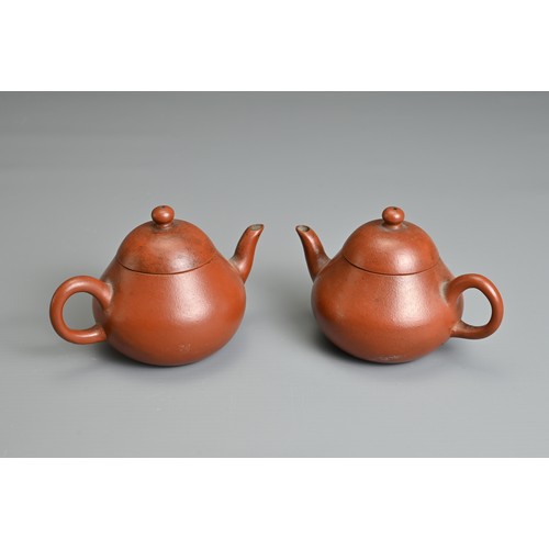 59 - A PAIR OF SMALL CHINESE YIXING POTTERY TEAPOTS, MENG CHENG MARK. Undecorated with inscribed poem to ... 