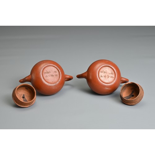 59 - A PAIR OF SMALL CHINESE YIXING POTTERY TEAPOTS, MENG CHENG MARK. Undecorated with inscribed poem to ... 