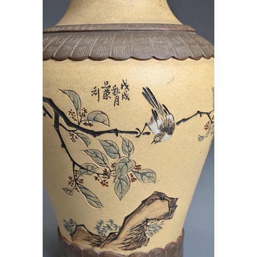 62 - A CHINESE YIXING POTTERY VASE, MA RONGYUAN, 1958. OF baluster form with carved decoration with bird ... 