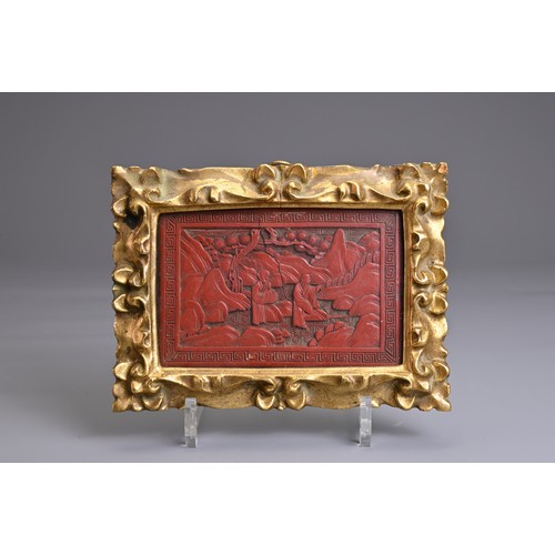 66 - A CHINESE FRAMED CINNABAR LACQUER PANEL WITH BAMBOO BRUSH POT, 19/20TH CENTURY. The panel decorated ... 