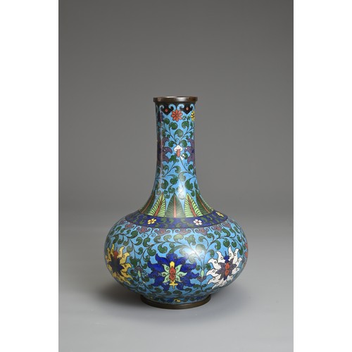 69 - A CHINESE CLOISONNE ENAMEL BOTTLE VASE, EARLY 20TH CENTURY. Decorated with chrysanthemums with leafy... 