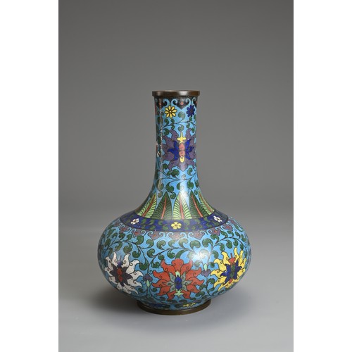 69 - A CHINESE CLOISONNE ENAMEL BOTTLE VASE, EARLY 20TH CENTURY. Decorated with chrysanthemums with leafy... 