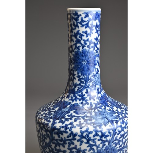 71 - A CHINESE BLUE AND WHITE PORCELAIN VASE, 19TH CENTURY. Decorated with chrysanthemum and lotus flower... 