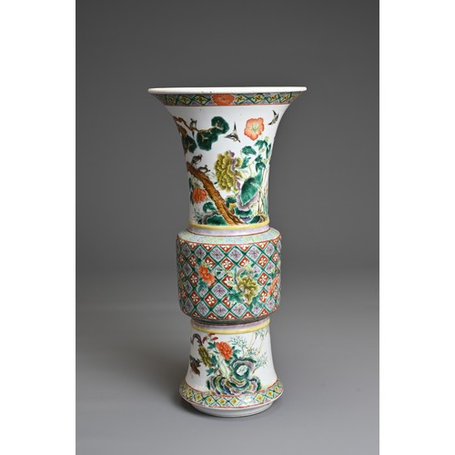 72 - A CHINESE FAMILLE ROSE PORCELAIN GU VASE, 19/20TH CENTURY. Decorated with various birds and foliage.... 