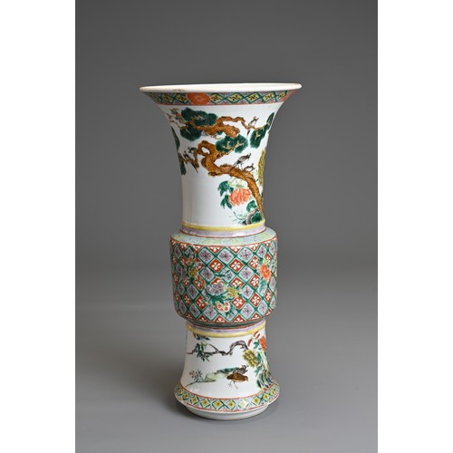 72 - A CHINESE FAMILLE ROSE PORCELAIN GU VASE, 19/20TH CENTURY. Decorated with various birds and foliage.... 