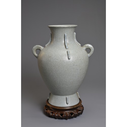 73 - A CHINESE LEI FORM PORCELAIN VASE, 18/19TH CENTURY. Archaistic form modelled on the bronze Lei form ... 