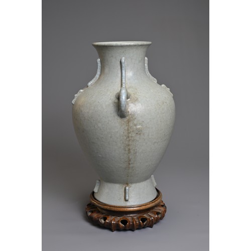 73 - A CHINESE LEI FORM PORCELAIN VASE, 18/19TH CENTURY. Archaistic form modelled on the bronze Lei form ... 