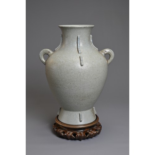 73 - A CHINESE LEI FORM PORCELAIN VASE, 18/19TH CENTURY. Archaistic form modelled on the bronze Lei form ... 