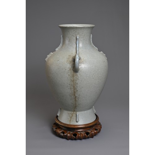 73 - A CHINESE LEI FORM PORCELAIN VASE, 18/19TH CENTURY. Archaistic form modelled on the bronze Lei form ... 