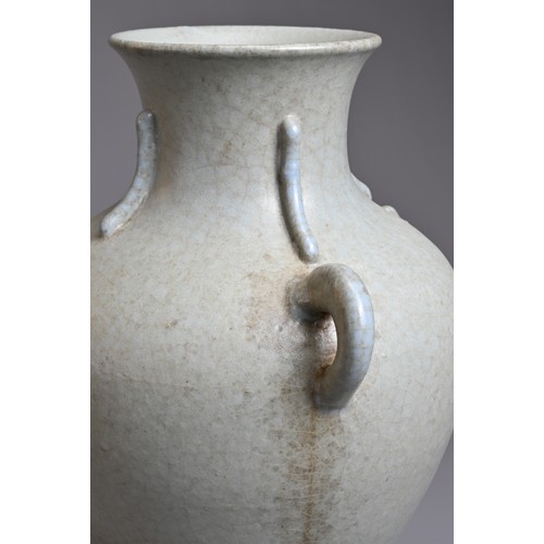 73 - A CHINESE LEI FORM PORCELAIN VASE, 18/19TH CENTURY. Archaistic form modelled on the bronze Lei form ... 