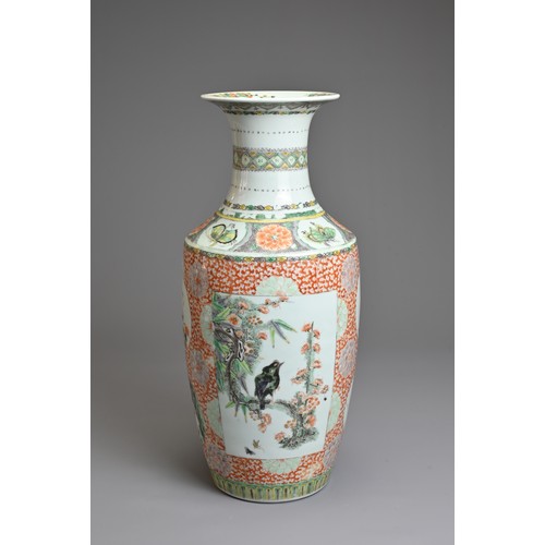 74 - A CHINESE FAMILLE ROSE PORCELAIN VASE, 19TH CENTURY.   Of baluster form decorated with rectangular p... 