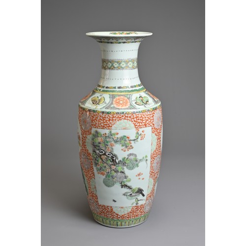 74 - A CHINESE FAMILLE ROSE PORCELAIN VASE, 19TH CENTURY.   Of baluster form decorated with rectangular p... 