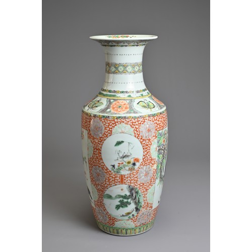 74 - A CHINESE FAMILLE ROSE PORCELAIN VASE, 19TH CENTURY.   Of baluster form decorated with rectangular p... 