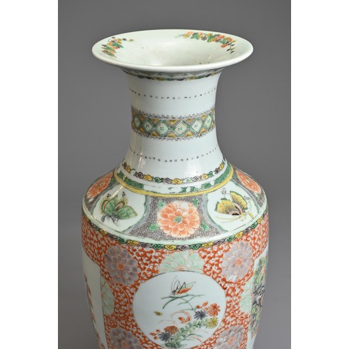 74 - A CHINESE FAMILLE ROSE PORCELAIN VASE, 19TH CENTURY.   Of baluster form decorated with rectangular p... 